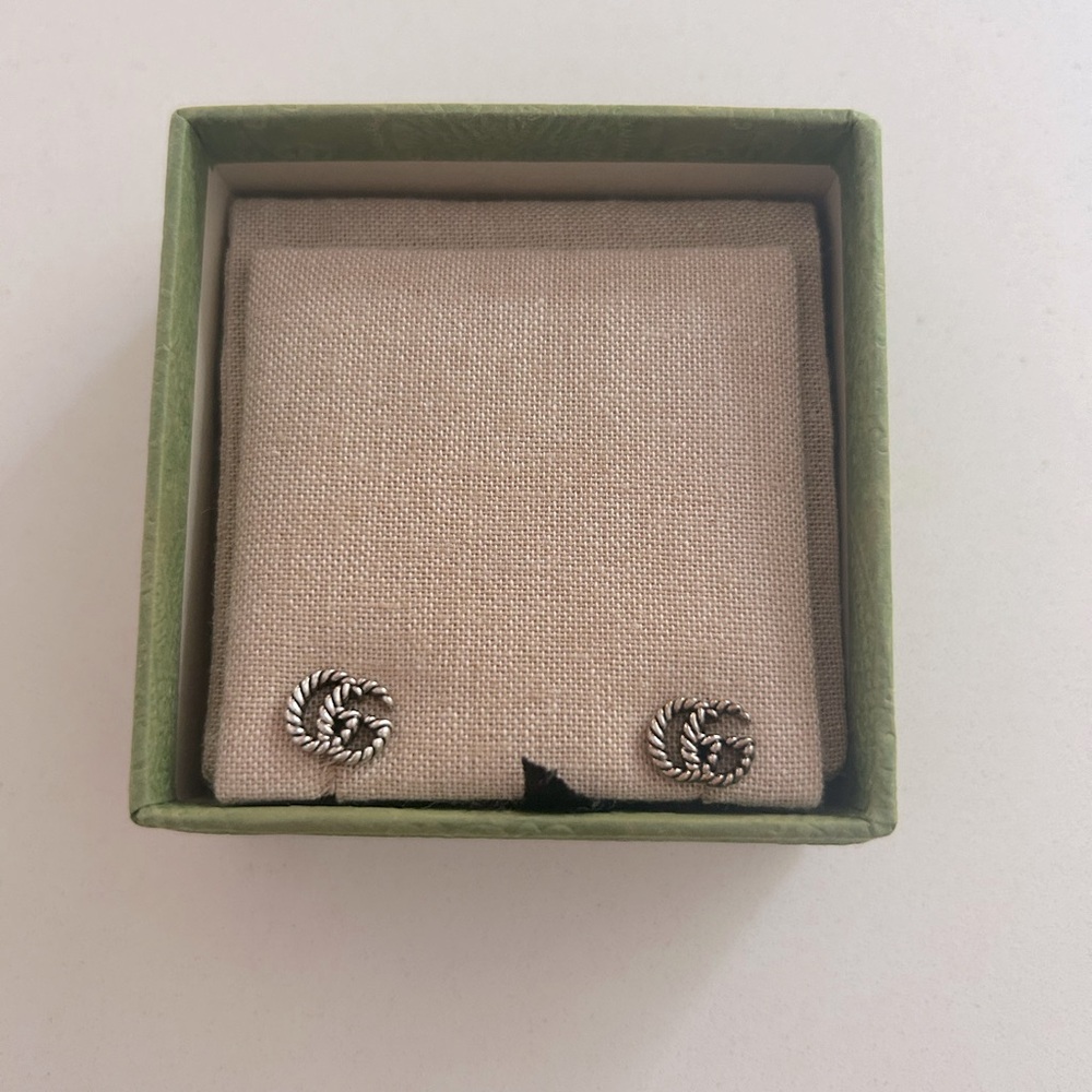 Gucci earrings never worn